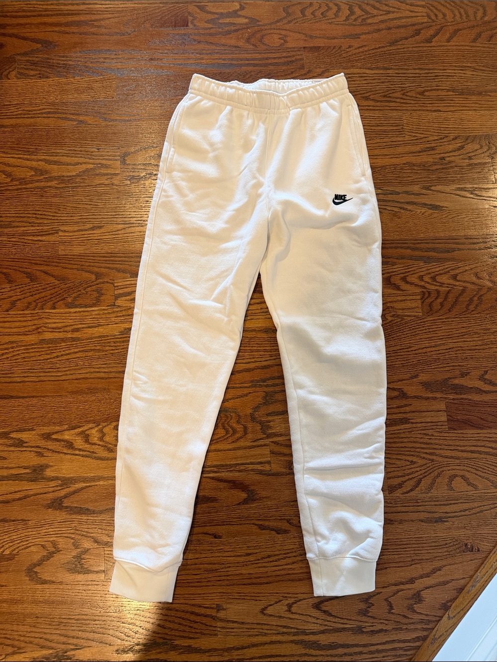 Nike Men's White Jogger Sweatpants with Black Swoosh. Brand New With Tags